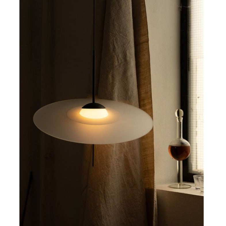 DCW Editions Mono pendant in window with decanter on window sill