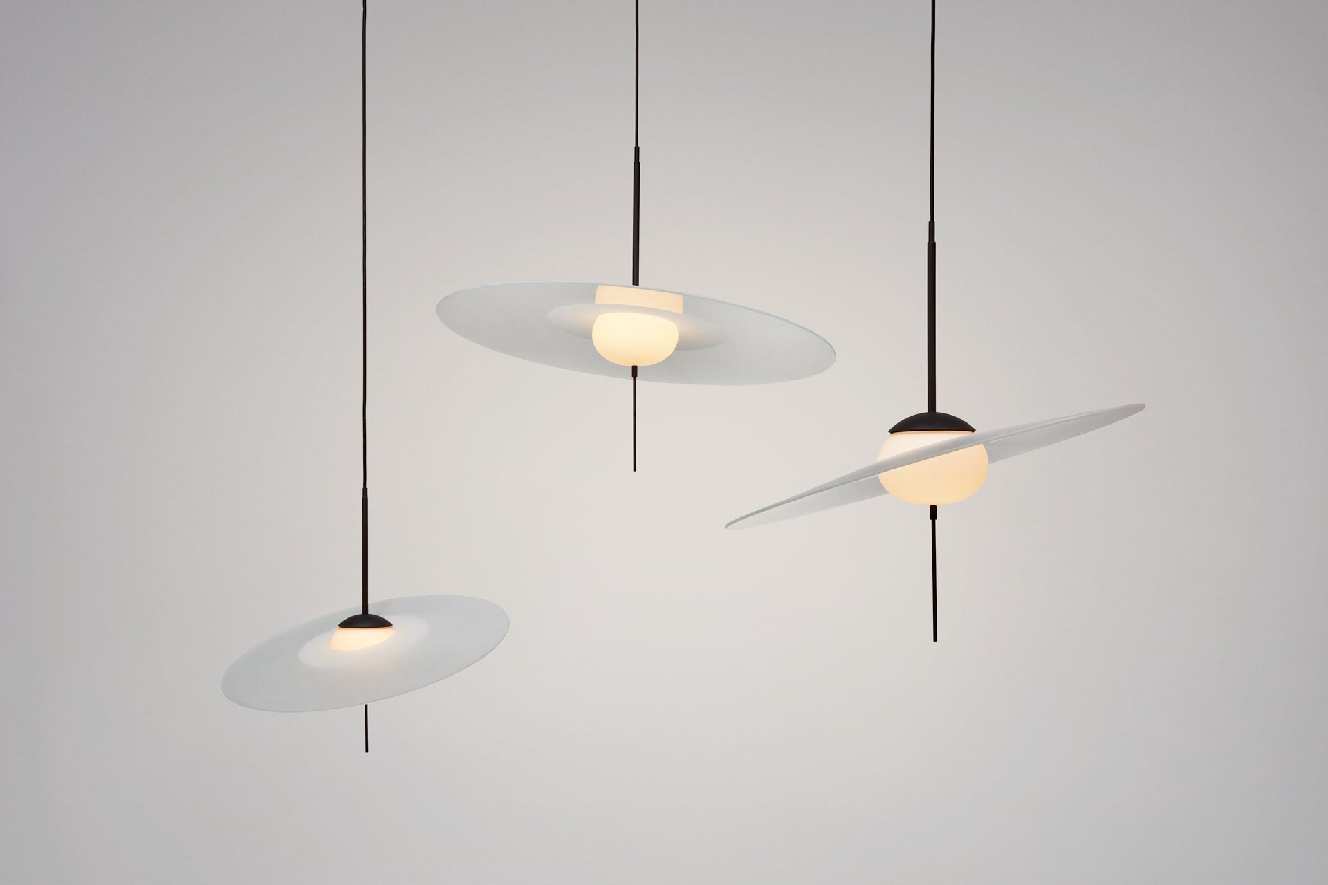 DCW Editions Mono 40, 50 and 60 pendants on grey background