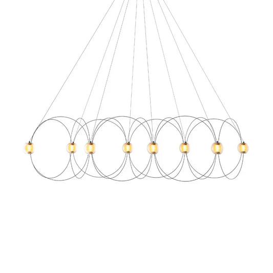 DCW Editions Munari pendant with black, curved rods and 8 acrylic spheres with warm light on white background