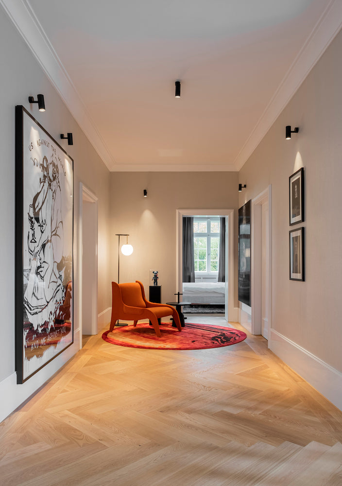 Nihm-Floor-Lamp-In-Situ-Wide-Hallway-with-Chair