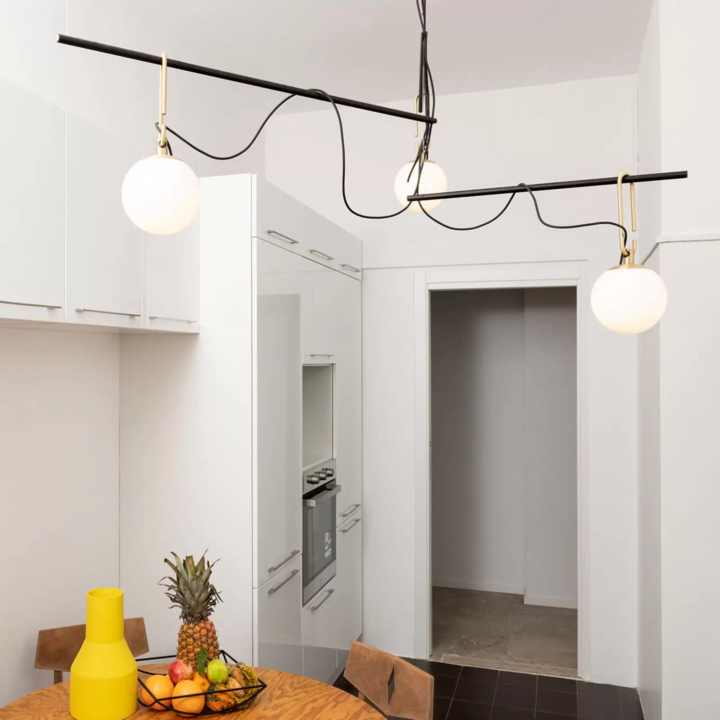 Nihm-Linear-Pendant-3-Arm-In-Situ-In-Kitchen-with-High-Ceilings