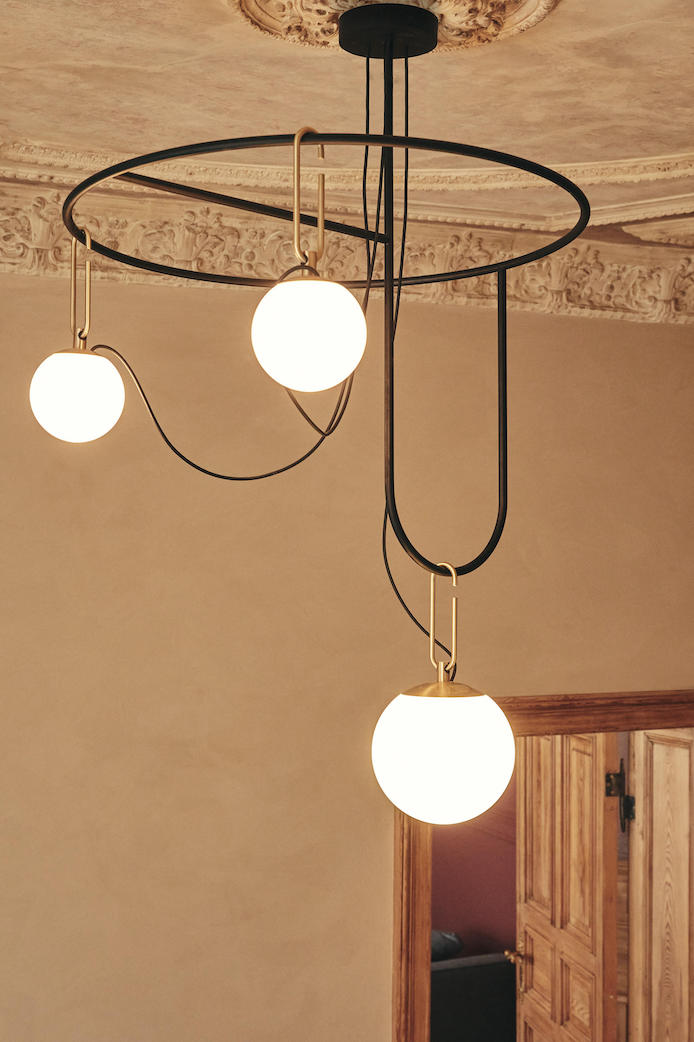 Nihm-Round-Pendant-in-situ-with-off-white-walls-and-moulding