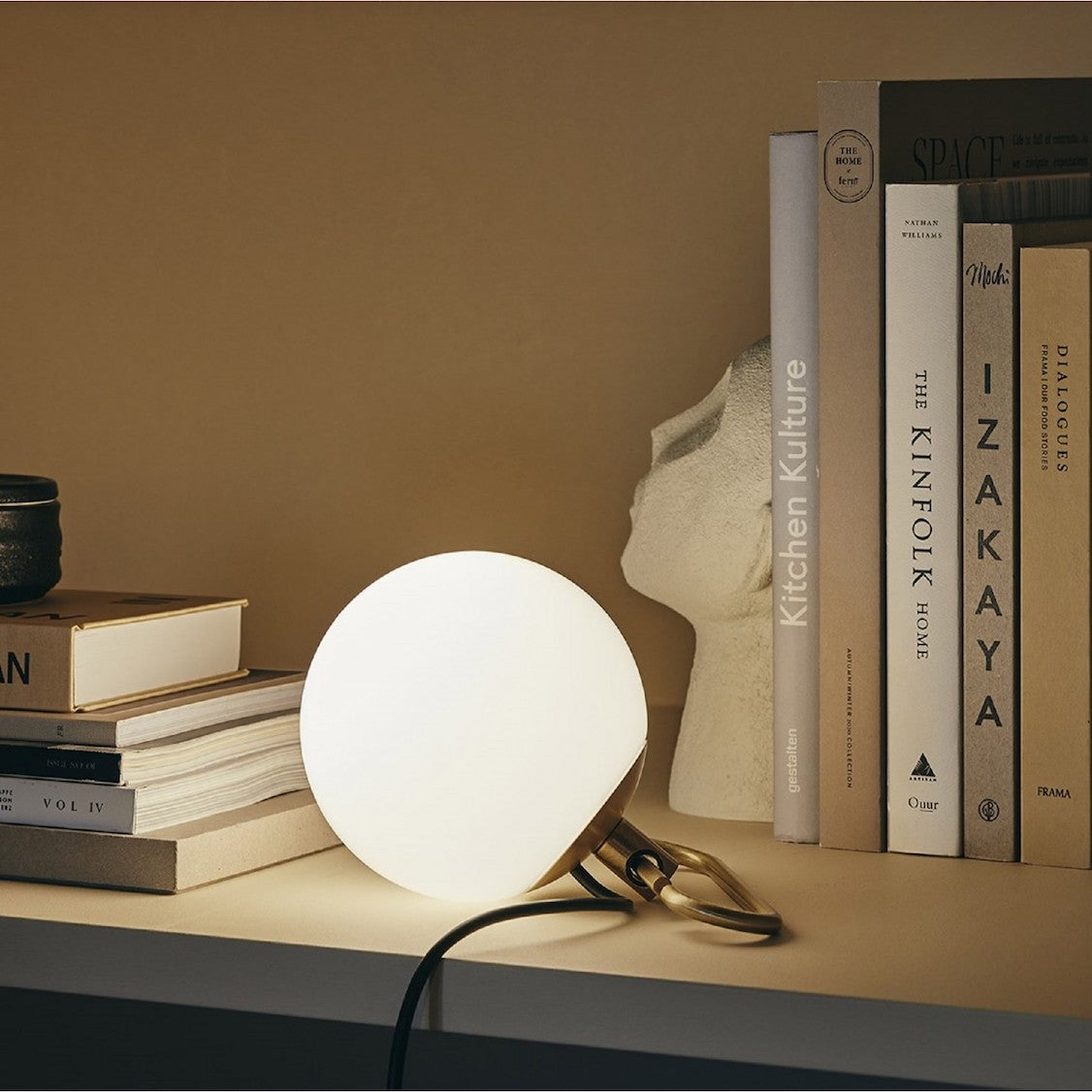 Nihm-Table-Lamp-In-Situ-on-Bookcase