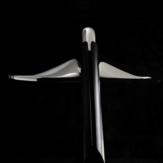 DCW Editions Niwaki black and chrome desk light from the back with black background