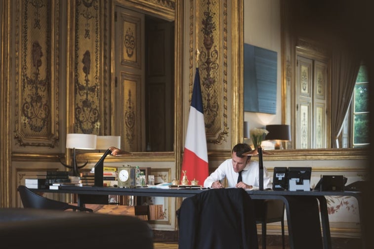 DCW Editions Niwaki desk light on the president of France's desk with president Macron signing documents