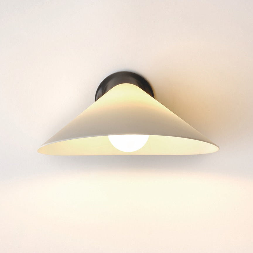 DCW Editions Plume wall light with white shade and black base with white background