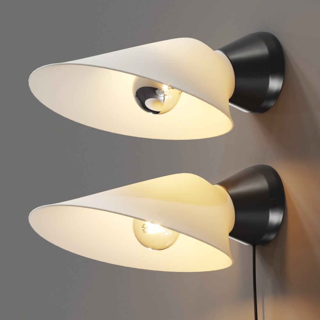 DCW Editions Plume Wall Lights with wide off-white shades and black bases, one with a cable