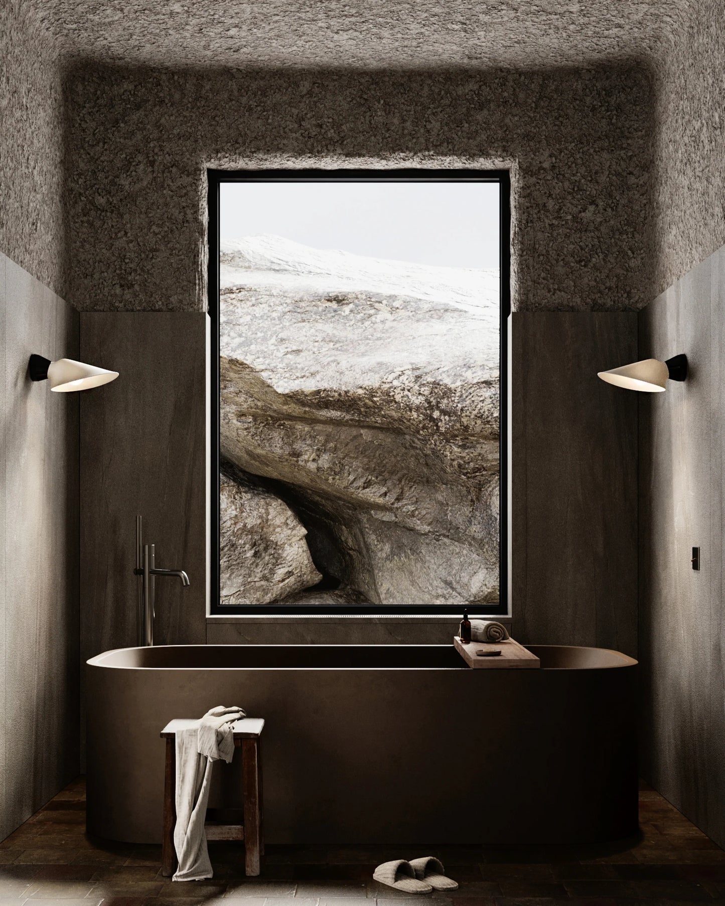 DCW Editions Plume wall lights on either side of brown bathtub with a large window between showing rocks