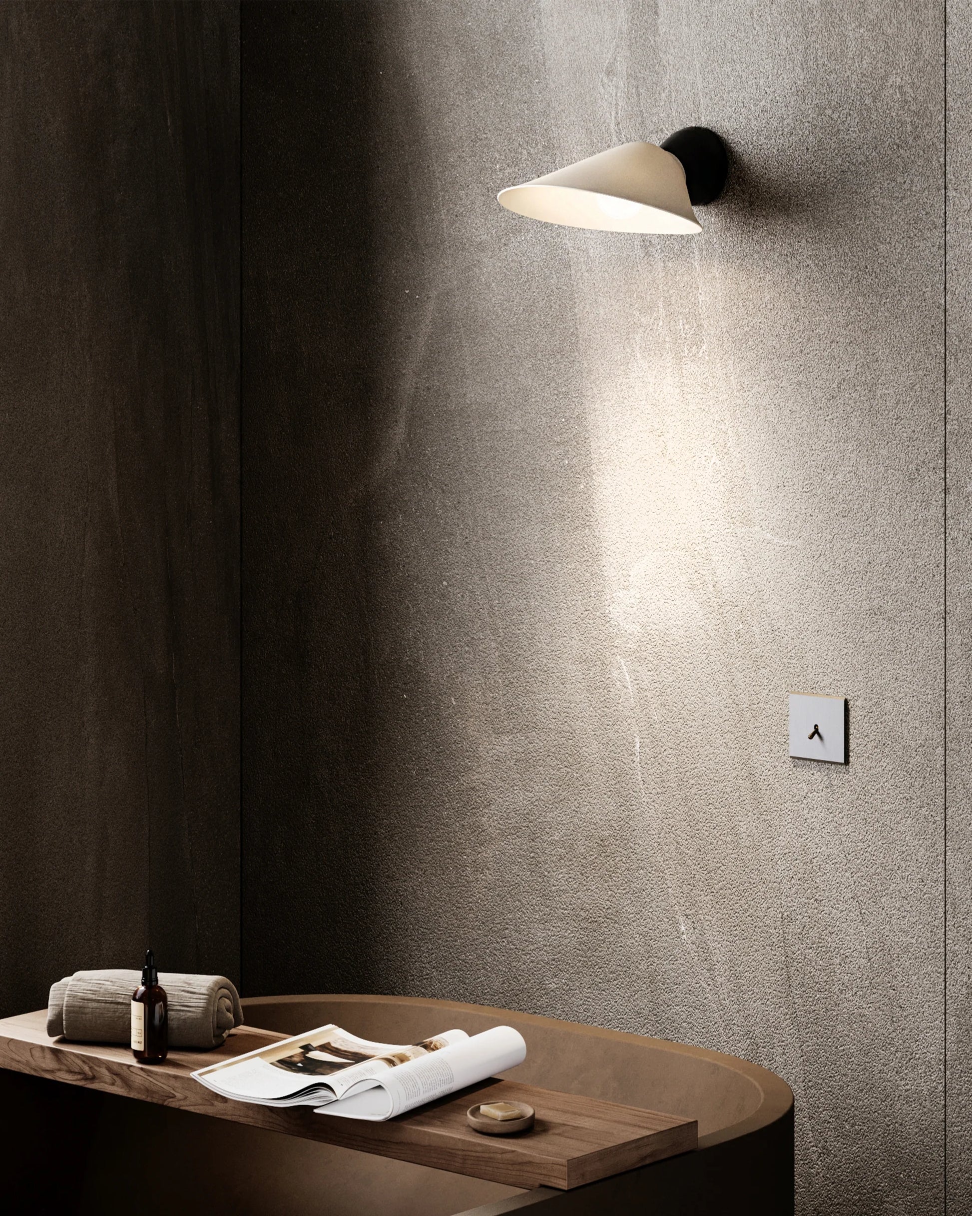 DCW Editions Plume Wall light over tub with magazine table