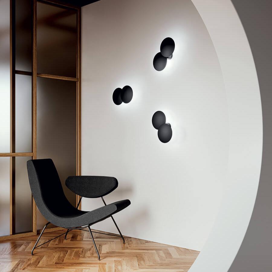 Puzzle-Black-Round-Double-In-Situ-with-Black-Chair