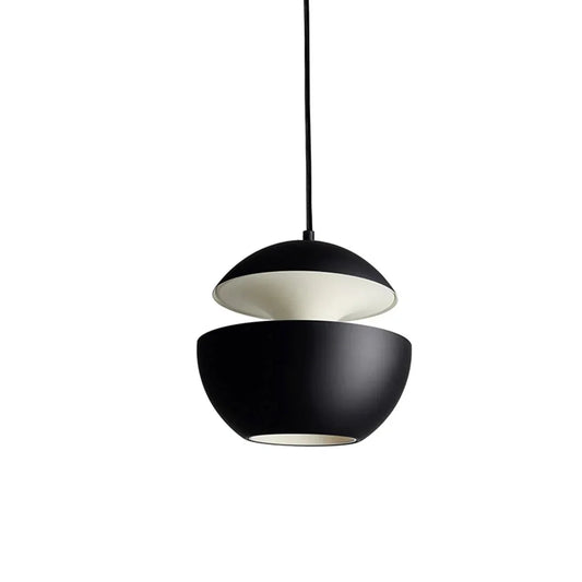 Black pendant light with white interior on a white background